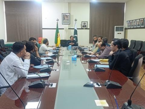secretary in a meeting with tobacco companies